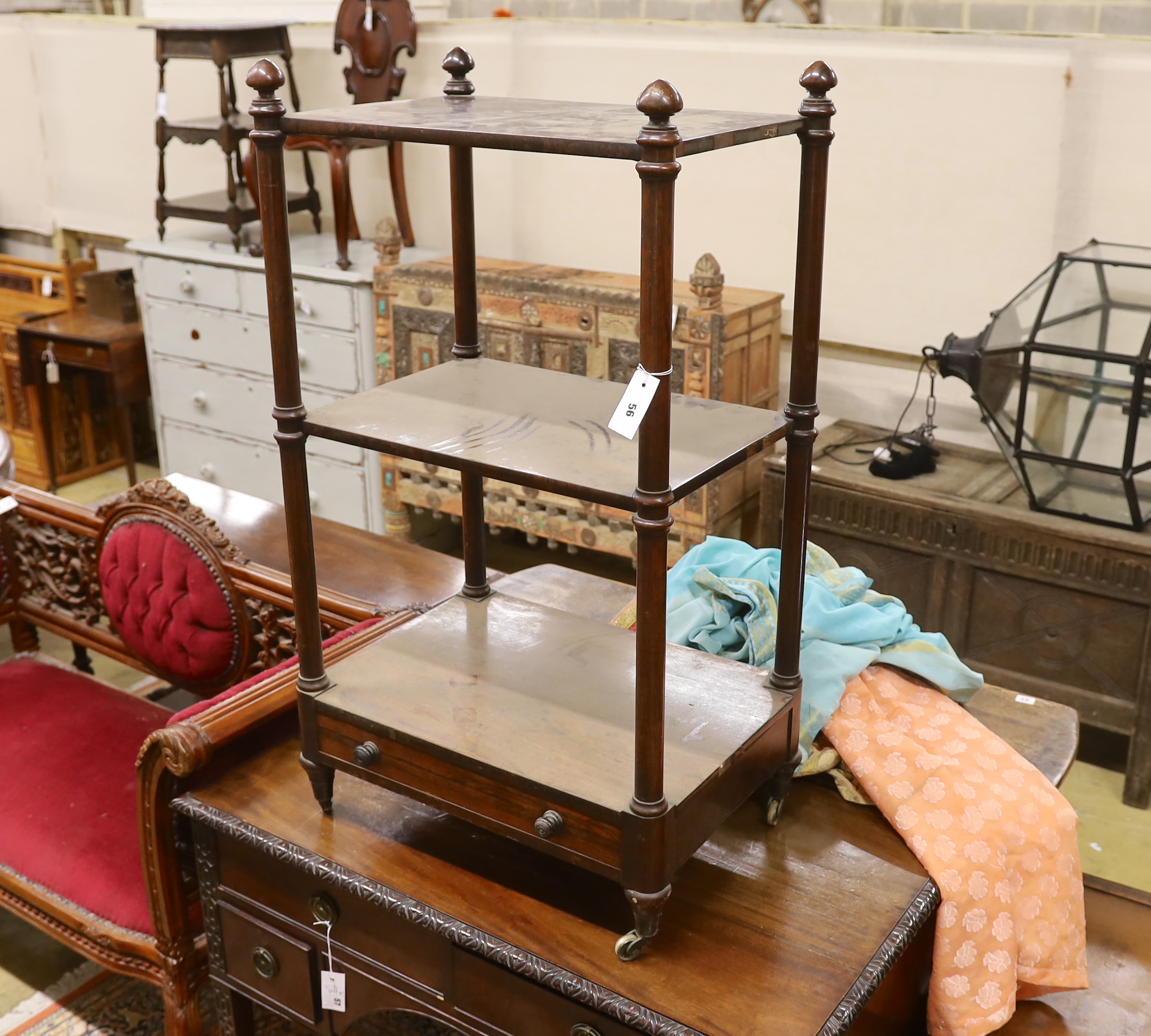 A 19th century Continental rosewood three tier whatnot, width 60cm, depth 42cm, height 108cm